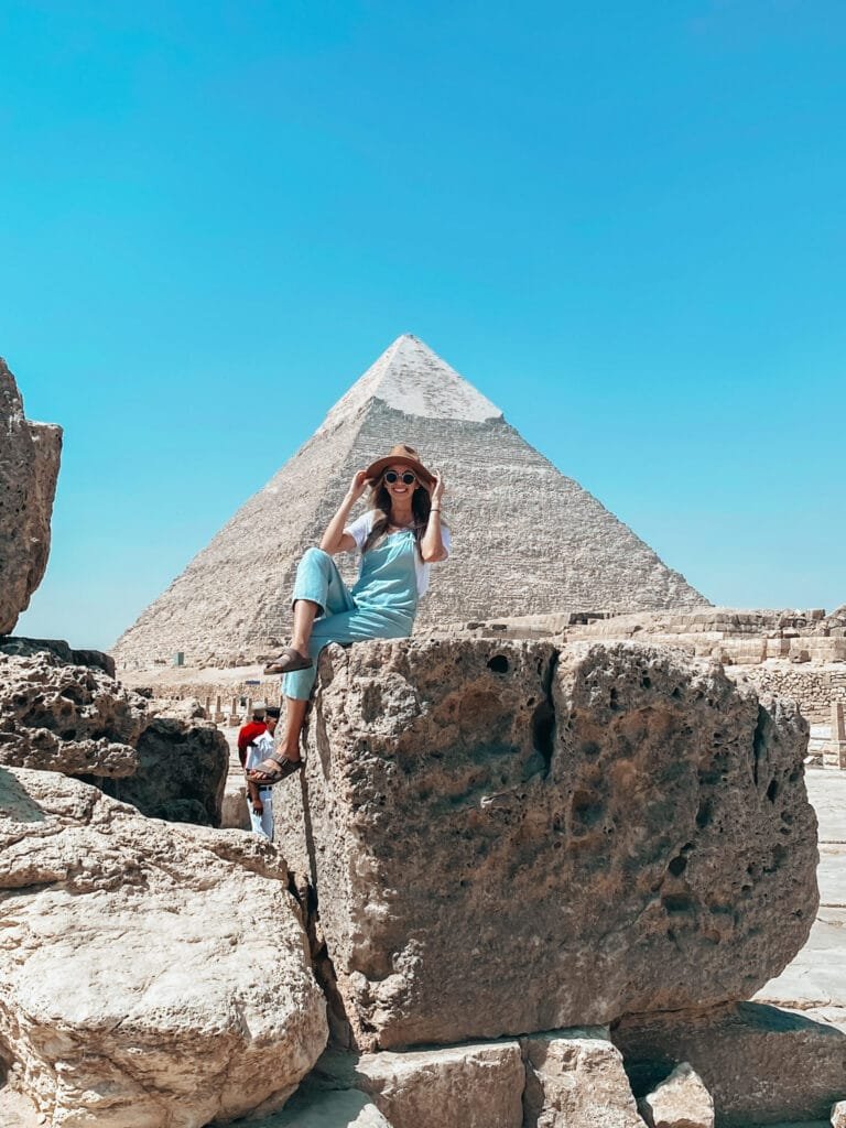 Picture in front of the Pyramids, traveling to egypt as a woman