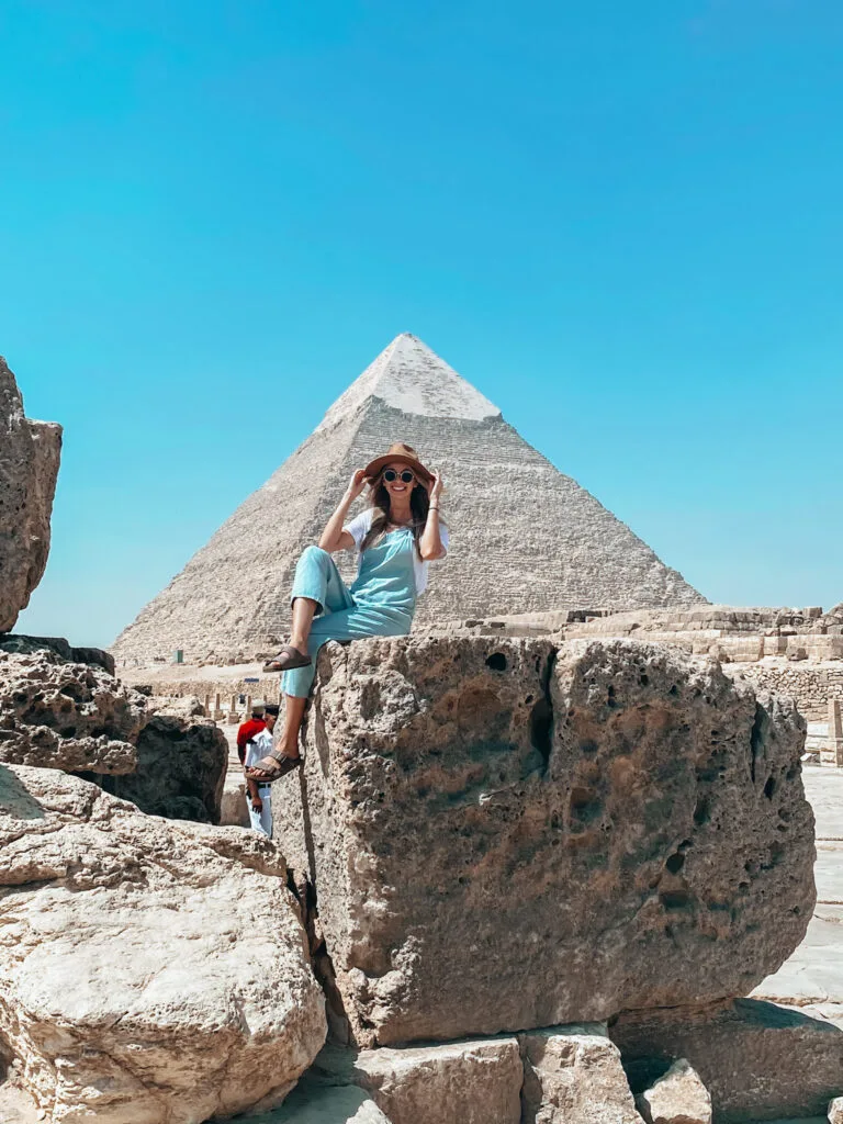 Picture in front of the Pyramids, traveling to egypt as a woman