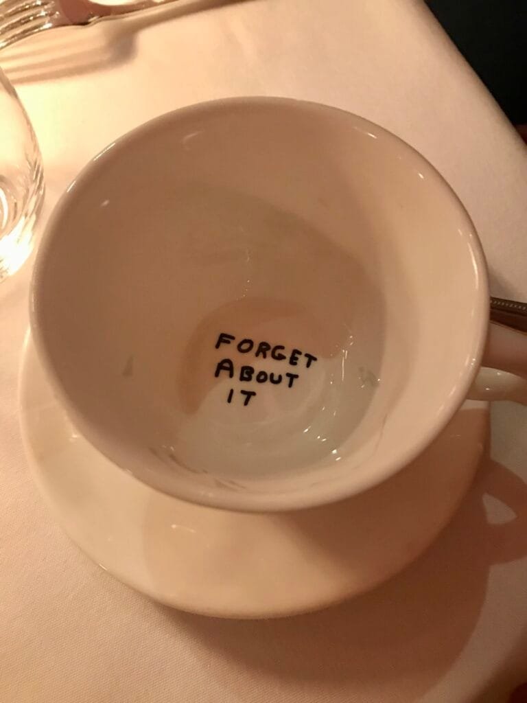 The bottom of the tea cup during a quirky afternoon tea in London