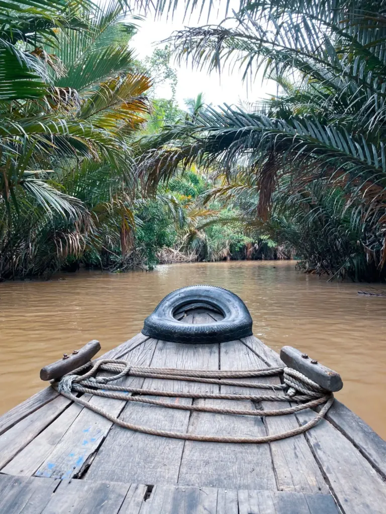 Riding on a traditional boat on the Mekong Delta in Vietnam
