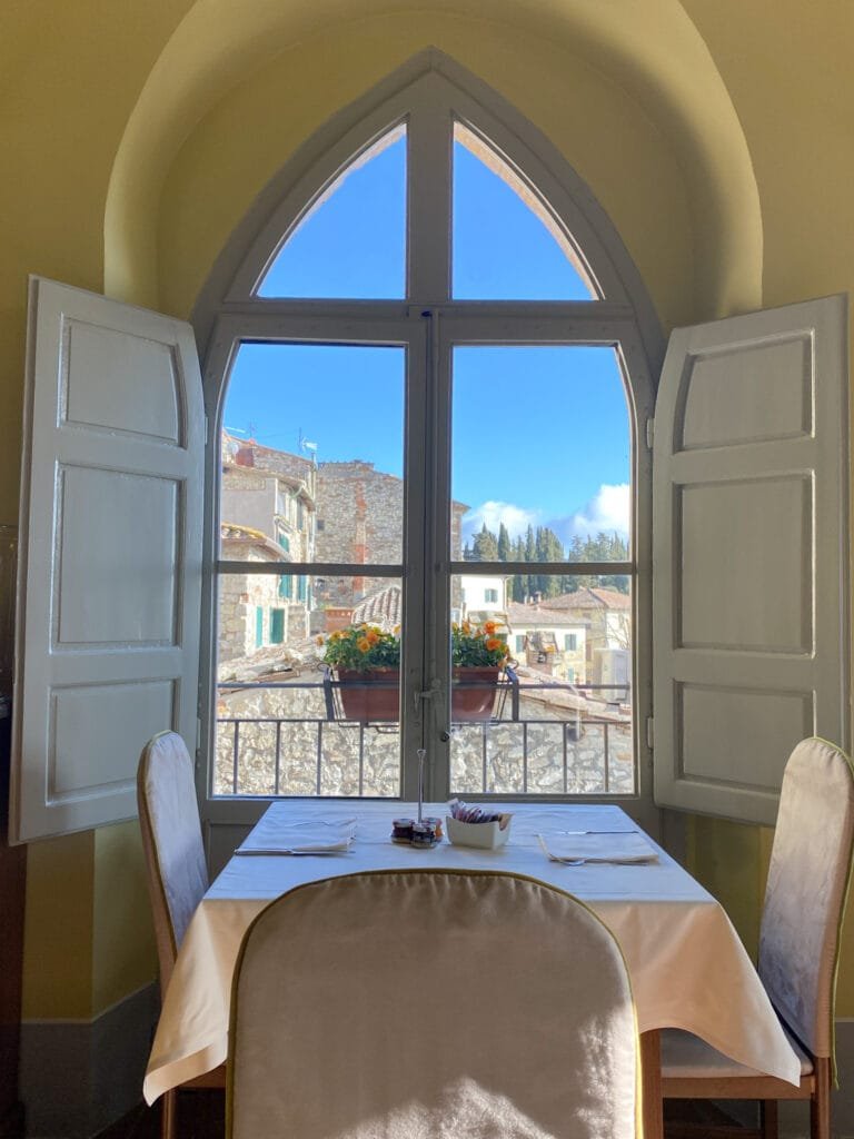 The beautiful window at breakfast overlooking the town of Radda in Chianti at the palazzo leopoldo dimora storica & spa