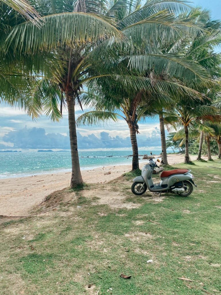 Parking my scooter at the beach in Koh Lanta during my two weeks in Thailand trip