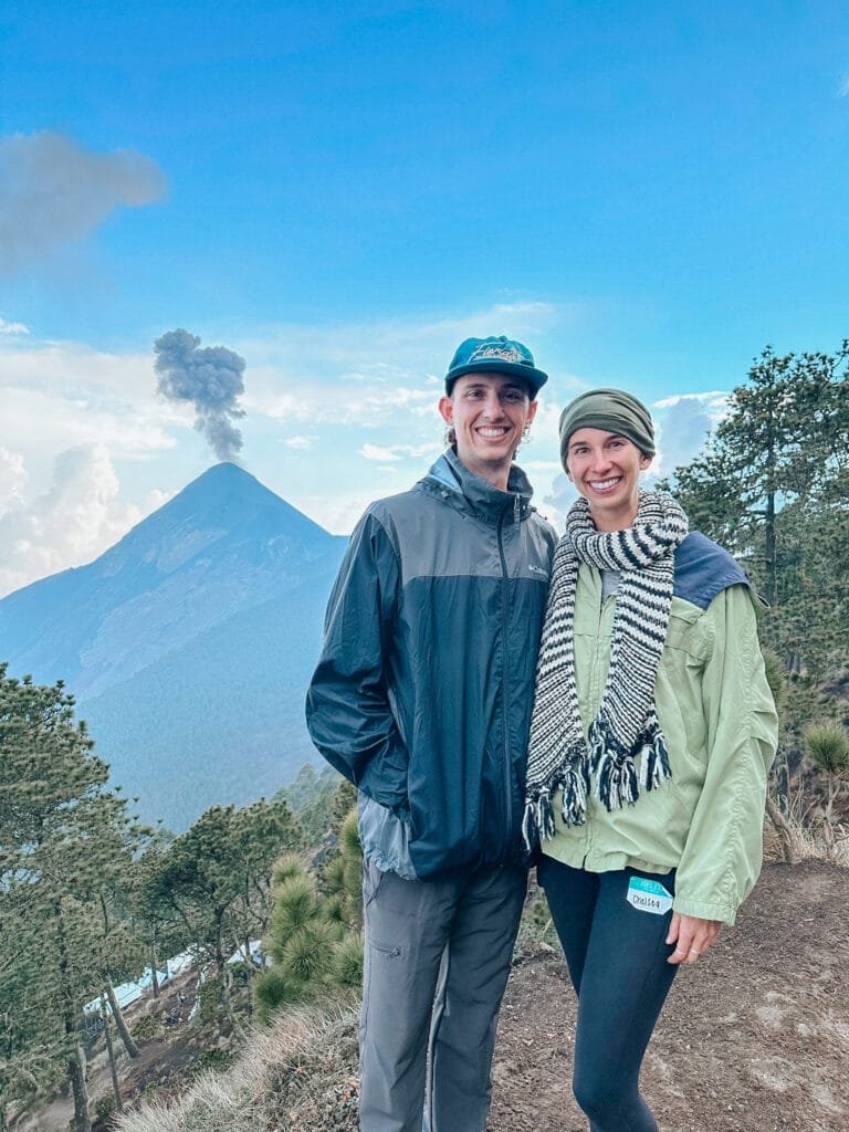 Basecamp for the overnight Acatenango Hike. Wearing basically everything on my packing list for the Acatenango overnight hike -- scarf, gaiter, raincoat, layers, hiking boots.