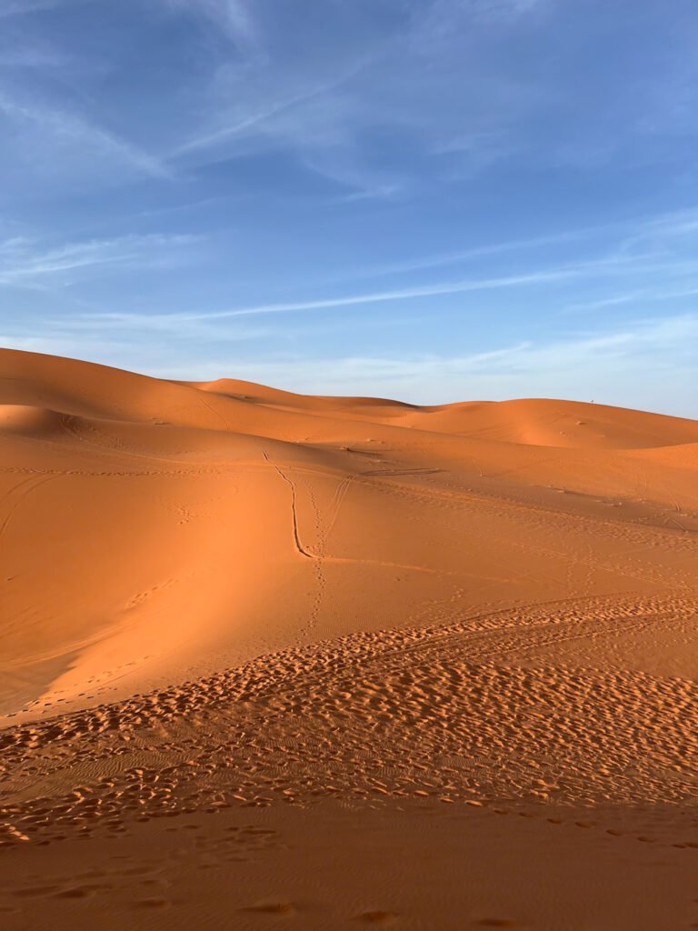 Sunsetting on the dunes of the Sahara desert on a 3 day sahara desert trip from mararakech to fes