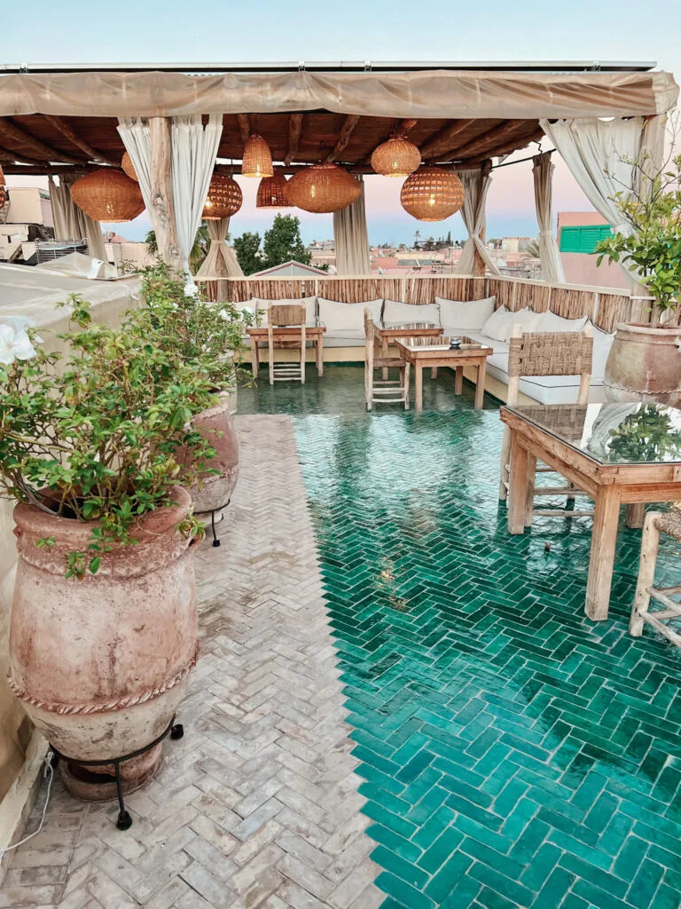 Rooftop view at a riad in Marrakech. All the best of Marrakech, rootops, sunsets, and beautiful tiles and boho decoration.