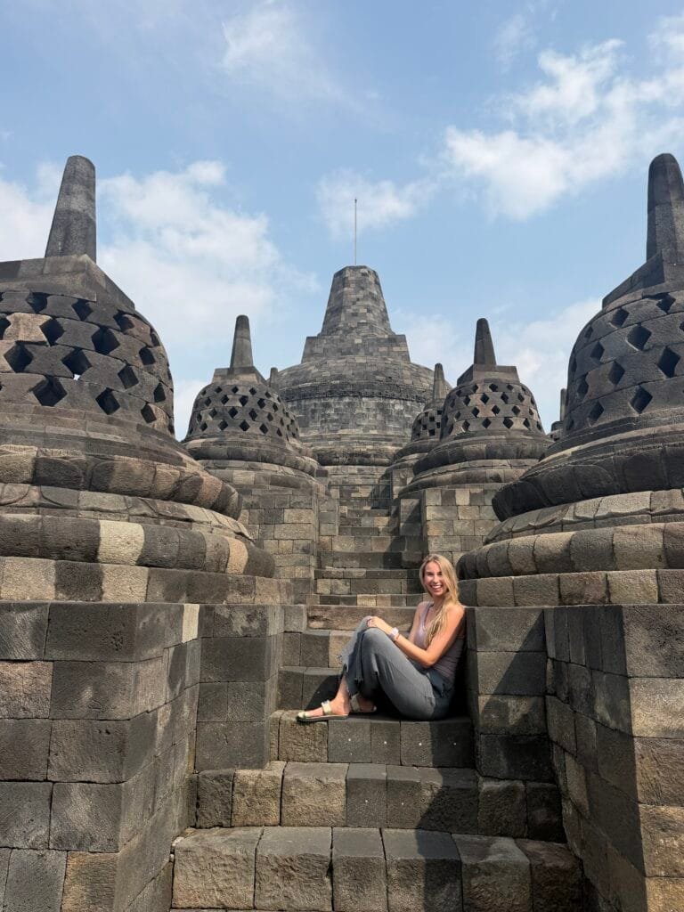 Sitting on Borobudur in Java, Indonesia