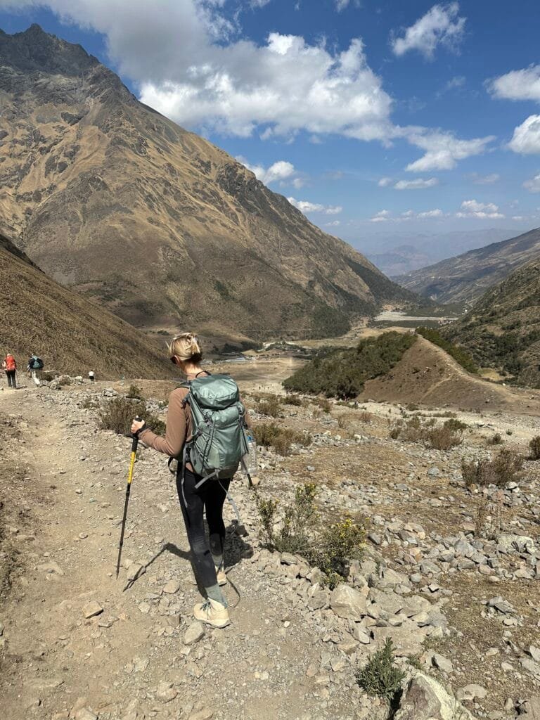 A woman hiking on the Salkantay Trek in Peru